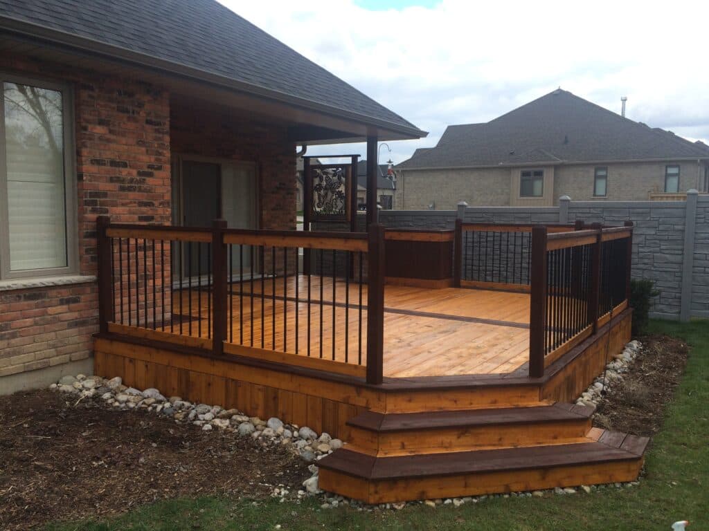 Premium stained backyard deck by DeckStain.ca